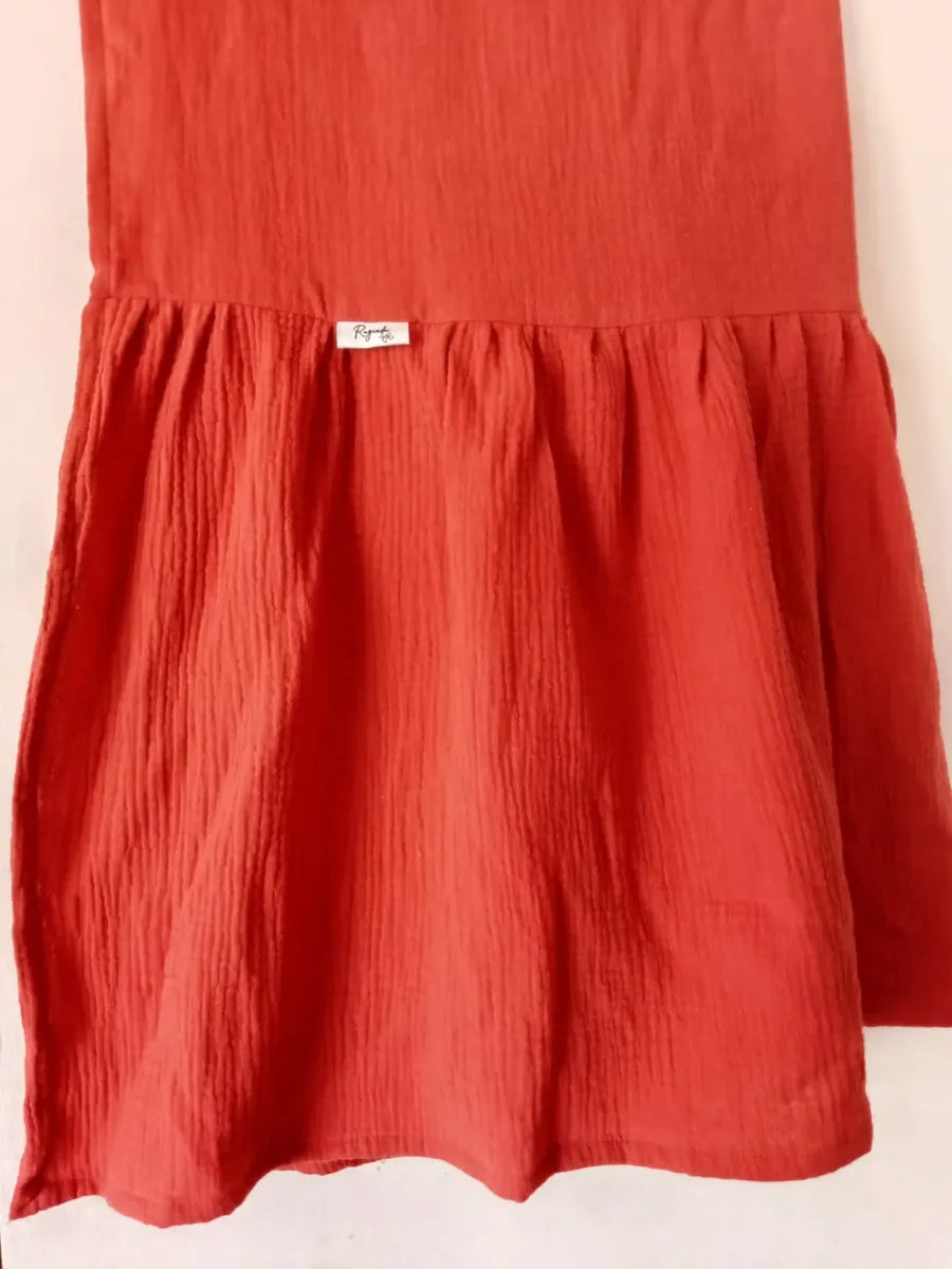 pie de cama manta volados color ladrillo terracota naranja muselina dormitorio sofa