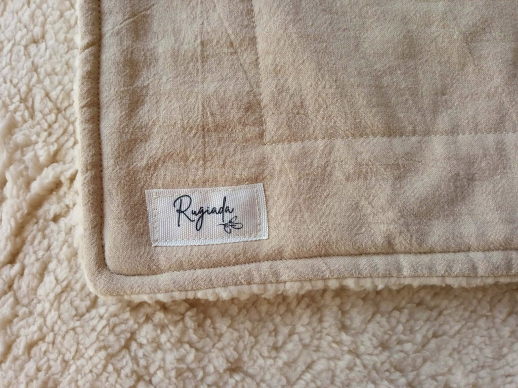 pie de cama throw manta de sherpa y tusor beige Rugiada